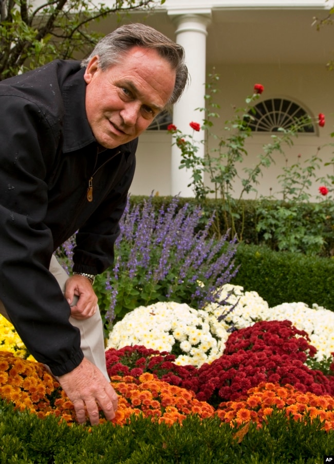 FILE - Dale Haney, Superintendent of the White House Grounds, poses for a photo in the Rose Garden at the White House in Washington Thursday, Oct. 15, 2009. (AP Photo/Alex Brandon)