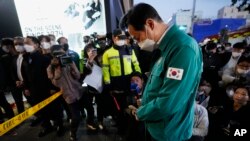 Seoul's Mayor Oh Se-hoon pays tribute for victims at the scene of a deadly stampede in Seoul, which killed dozens of people and injured dozens, Oct. 30, 2022,