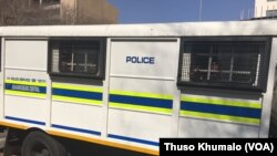 South Africa police van carrying prisoners