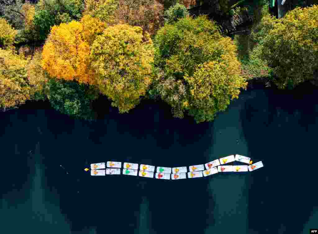 An aerial view shows pedal boats at the Hengstey lake near Hagen, western Germany.