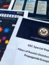FILE - Pages from the U.S. State Department's Global Engagement Center report on Russian disinformation released on Aug. 5, 2020, are displayed. The United States will sign a memorandum of understanding to cooperate with South Korea and Japan in the fight against disinformation. 