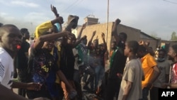 Demonstrators shout slogans during a protest in N'Djamena, Chad, Oct. 20, 2022. 