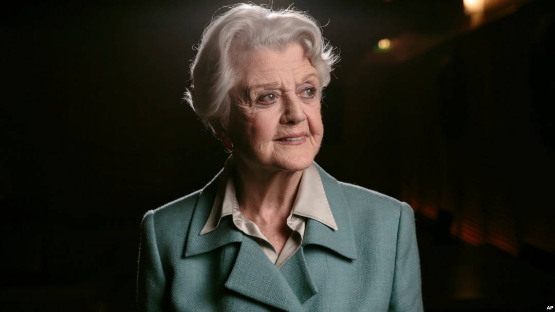 FILE - Angela Lansbury poses for a portrait during press day for "Blithe Spirit" in Los Angeles, Dec. 16, 2014. Lansbury died peacefully at her home in Los Angeles on Tuesday. She was 96. 