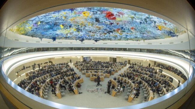 FILE - Overview of the Human Rights Council at the United Nations in Geneva, Sept. 12, 2022. Picture taken with a fish-eye lens.