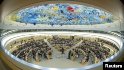 FILE - Overview of the Human Rights Council at the United Nations in Geneva, Sept. 12, 2022. Picture taken through a fish-eye lens.
