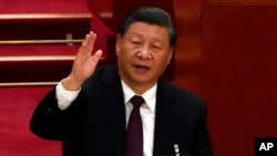 Chủ tịch Trung Quốc Tập Cận Bình dự lễ bế mạc Đại hội Đại biểu Toàn quốc lần thứ 20 của Đảng Cộng sản cầm quyền Trung Quốc tại Đại lễ đường Nhân dân ở Bắc Kinh, ngày 22 tháng 10 năm 2022.