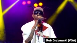 FILE - Coolio performs on Aug. 7, 2022, at RiverEdge Park in Aurora, Ill. Coolio, the rapper who was among hip-hop's biggest names of the 1990s with hits including “Gangsta's Paradise” and “Fantastic Voyage,” died Wednesday, Sept. 28, 2022, at age 59, his manager said.