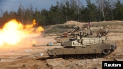 Танк M1A1 Abrams армії США під час військових тренувань НАТО Crystal Arrow 2021 в Латвії, 26 березня 2021 р.