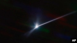 美国宇宙飞船撞击“双卫一”小行星时形成的宇宙尘埃（2022年9月26日）