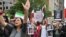 People demonstrate during a protest for Mahsa Amini, who died in custody of Iran's morality police, in Montreal, Quebec, Canada, Oct. 1, 2022.