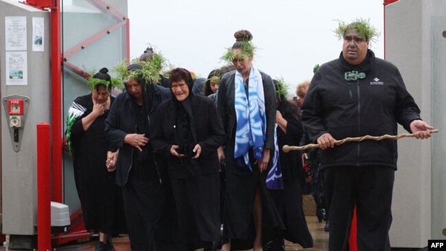 Descendants attend a welcoming ceremony for Maori and Moriori ancestral remains that were returned from the Natural History Museum Vienna at Te Papa, the national museum of New Zealand in Wellington, Oct. 2, 2022.