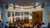 This photograph taken on August 13, 2018 show Pakistani legislators taking oath during the first session of the provincial assembly after the July 25 general election, in Peshawar. / AFP PHOTO / ABDUL MAJEED