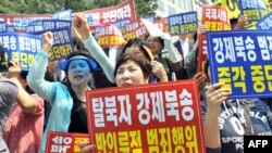 한국 수도 서울 시내에서 중국 정부의 탈북자 강제북송 중단을 요구하는 집회가 진행되고 있다. (자료사진)