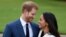 Prince Harry and Meghan Markle pose during an official photocall to announce thier engagement at The Sunken Gardens at Kensington Palace on Nov. 27, 2017 in London, England. 