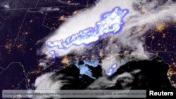 A satellite image provided by NOAA shows a thunderstorm and megaflash lightning on April 29, 2020, in this screengrab taken from video, Feb. 1, 2022.
