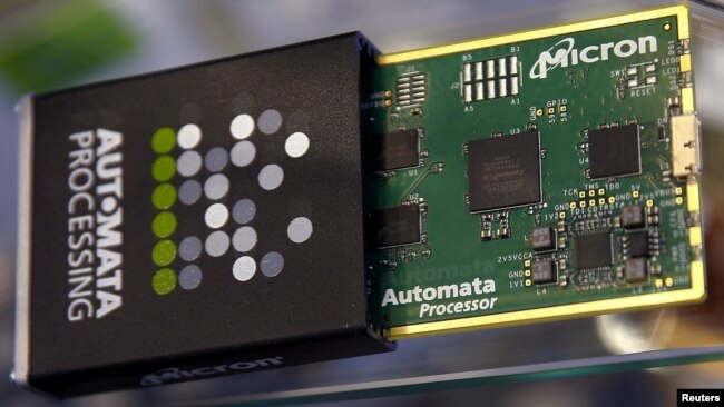 FILE - Memory chip parts of U.S. memory chip maker MicronTechnology are pictured at their booth at an industrial fair in Frankfurt, Germany, July 14, 2015. (REUTERS/Kai Pfaffenbach/File Photo)