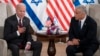 President Joe Biden, left, and Israeli Prime Minister Yair Lapid address the media following their meeting in Jerusalem, July 14, 2022.