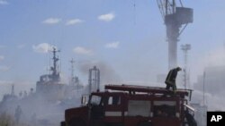 Фото: Одеський порті після обстрілу, червень 2022 року. (Мерія Одеси через AP)