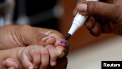 Вакцинация против полиомиелита в Карачи, Пакистан