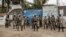 FILE: Soldiers of the U.N. peacekeeping mission MONUSCO take position in front of a U.N. base in Goma, in the North Kivu province of the Democratic Republic of Congo. Taken 7.26.2022