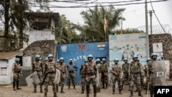 Soldiers of the U.N. peacekeeping mission MONUSCO take position in front of a U.N. base in Goma, in the North Kivu province of the Democratic Republic of Congo, July 26, 2022.