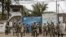 FILE - Soldiers of the U.N. peacekeeping mission MONUSCO take position in front of a U.N. base in Goma, in the North Kivu province of the Democratic Republic of Congo, July 26, 2022.
