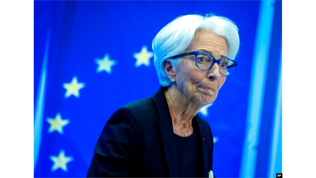 Christine Lagarde, president of the European Central Bank, smiles during a press conference following a meeting of the governing council in Frankfurt, Germany, July 21, 2022.