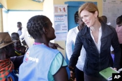 Samantha Power, right, visits a clinic in Kachoda, Turkana area, northern Kenya, July 23, 2022. (AP Photo/Desmond Tiro, File)