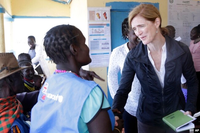 Samantha Power, right, visits a clinic in Kachoda, Turkana area, northern Kenya, July 23, 2022. (AP Photo/Desmond Tiro, File)