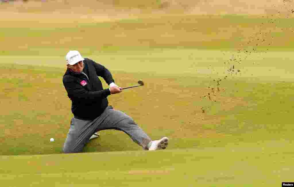 England&#39;s Marcus Armitage plays out of a bunker on the 14th during the second round at the 150th Open Championship, in St Andrews, Scotland.
