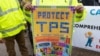 FILE - Demonstrators participate in the March for TPS (Temporary Protected Status) Justice during a protest in support of permanent residency, outside the White House in Washington, Feb. 12, 2019. 