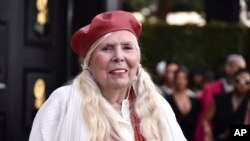 Joni Mitchell arrives at the 64th Annual Grammy Awards at the MGM Grand Garden Arena on Sunday, April 3, 2022, in Las Vegas. 