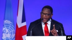 FILE - Malawi President Lazarus Chakwera speaks in Glasgow, Scotland, Nov. 1, 2021. Malawi’s main opposition party is pushing for Chakwera to resign because of the state of the country's economy.