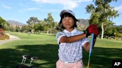Miroku Suto of Japan poses for a portrait after the final round at the Junior World Championships golf tournament held at Singing Hills Golf Resort on July 14, 2022, in El Cajon, Calif.