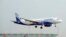 Pesawat Airbus A320 milik maskapai asal India, IndiGo, bersiap mendarat di Bandara Internasional Indira Gandhi di New Delhi, India, pada 24 Juni 2010. (Foto: AFP/Raveendran)