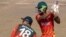 ফাইল ছবি-হারারে স্পোর্টস ক্লাবে জিম্বাবুয়ে এবং বাংলাদেশের মধ্যে প্রথম টি-টোয়েন্টি আন্তর্জাতিক ক্রিকেট ম্যাচ চলাকালীন জিম্বাবুয়ের রেজিস চাকাবভা বাংলাদেশের উইকেটরক্ষক নুরুল হাসানকে পাশ কাটিয়ে একটি শট খেলছেন।২২ জুলাই ২০২১। (ছবি-এএফপি/জেকেসাই জিকিজানা)