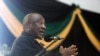 FILE: South Africa President Cyril Ramaphosa addresses delegates at the Olive Convention Centre in Durban, on July 24, 2022. Protesters sang and chanted slogans calling for his resignation.