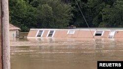 A submerged house is seen in flood affected area, in Breathitt County, Kentucky, July 28, 2022.
