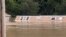 A submerged house is seen in flood affected area, in Breathitt County, Kentucky, July 28, 2022.