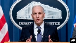 FILE - Matthew Olsen of the U.S. Justice Department speaks at a news conference in Washington, March 16, 2022. On July 29, 2022, the department charged Russian operative Aleksandr Viktorovich Ionov with recruiting political groups in the U.S. to advance pro-Russia propaganda. 