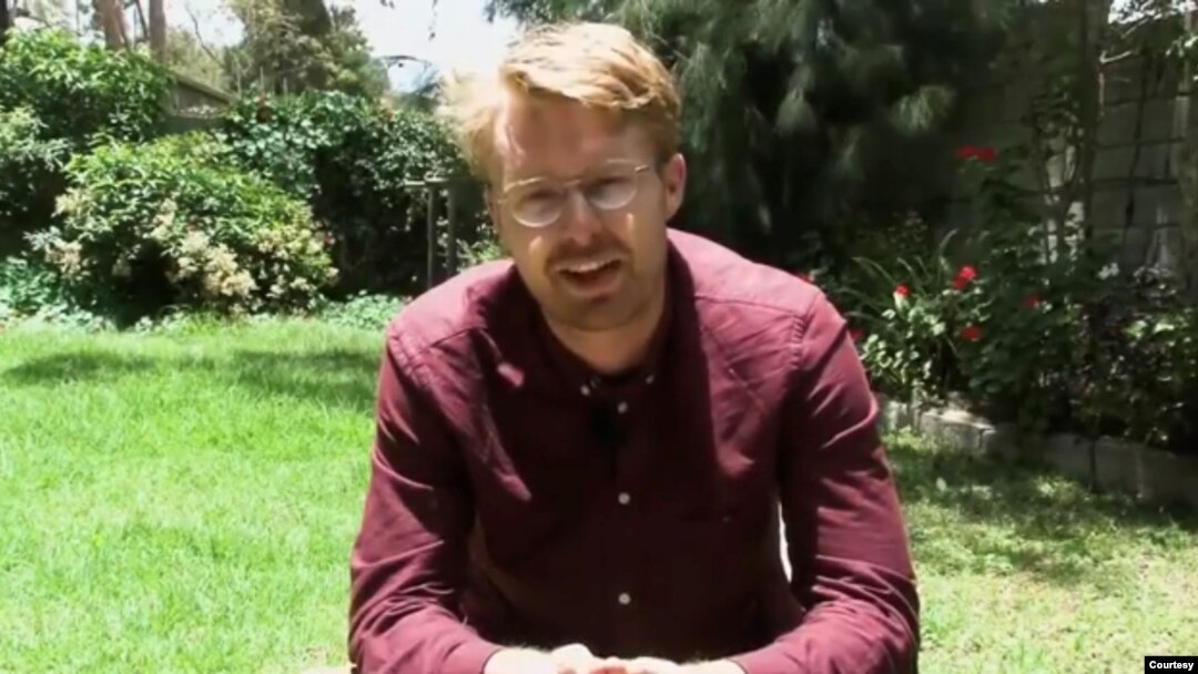 Tom Gardner, a reporter for The Economist, is seen in a video posted by the Pulitzer Center on Crisis Reporting in 2018.
