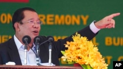 FILE - Cambodian Prime Minister Hun Sen speaks at the launching ceremony of the Cambodia-China Friendship Preah Kossamak Hospital in Phnom Penh, Cambodia, March 21, 2022. 