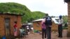 FILE - World Health Organization epidemic specialists visit a shanty town after an outbreak of the Marburg virus in Angola, April 10, 2005. Ghana recorded three cases of the virus in June 2022, but was declared free of Marburg on Sept. 16, 2022, a health official announced.