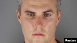 FILE - Former police officer Thomas Lane is shown in a booking photo at Hennepin County Jail in Minneapolis, Minn., June 3, 2020.