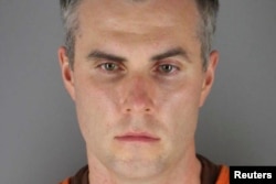 FILE - Former police officer Thomas Lane, is shown in a booking photo at Hennepin County Jail in Minneapolis, Minn., June 3, 2020.
