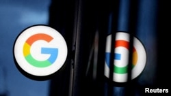 FILE: The logo for Google LLC is seen at the Google Store Chelsea in Manhattan, New York City. Taken November 17, 2021.