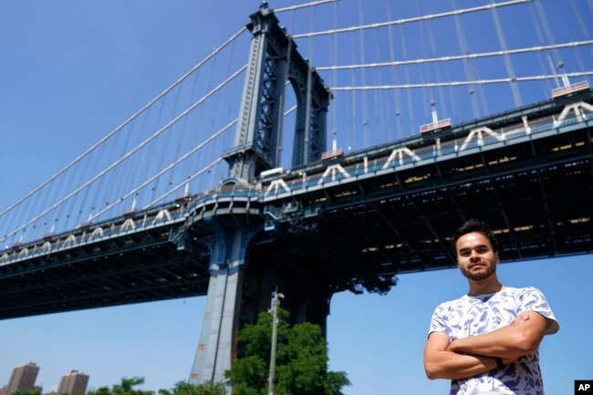 Research engineer Teven Le Scao, who helped create the new artificial intelligence language model called BLOOM, poses for a photo, Monday, July 11, 2022, in New York. (AP Photo/Mary Altaffer)