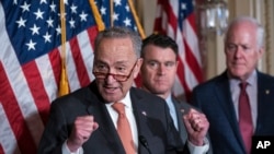 From left, Senate Majority Leader Chuck Schumer, D-N.Y., Sen. Todd Young, R-Ind., and Sen. John Cornyn, R-Texas, talk about the bipartisan effort to pass a bill designed to encourage more semiconductor companies to build chip plants in the United States,