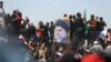 Iraqi Security Forces Clash With Cleric’s Followers 