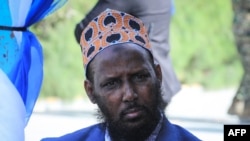 Somalias newly appointed Minister of Religious Affairs Muktar Robow Abu-Mansur, the former al-Shabab commander, appears as Somalia's Prime Minister Hamze Mohamed Barre announced his cabinet in Mogadishu, Somalia, on August 2, 2022